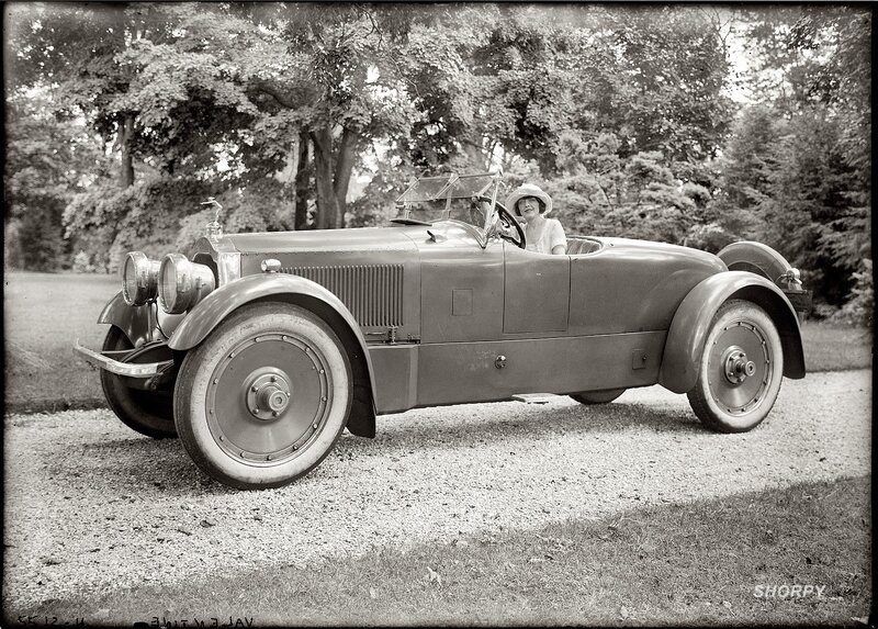 Woman in vintage car