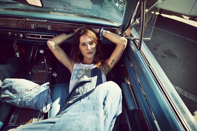woman in vintage car