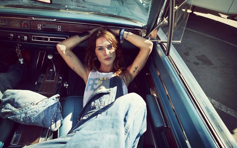 woman in vintage car