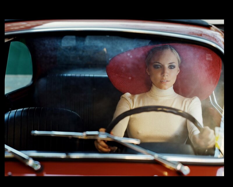 woman in vintage car