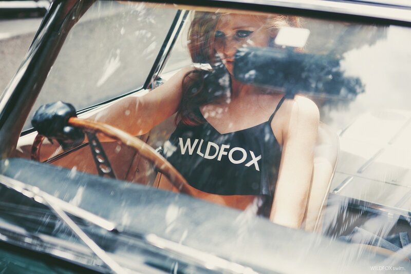 Woman in vintage car