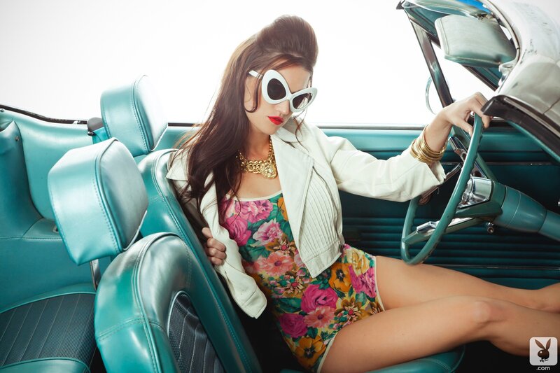 woman in vintage car
