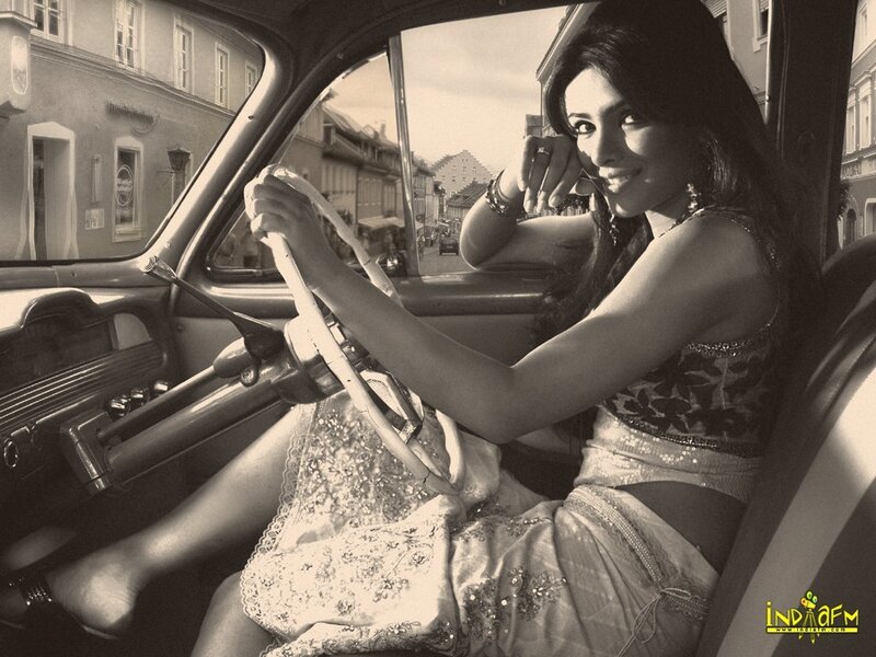 woman in vintage car