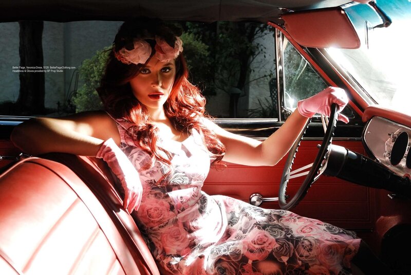 Woman in vintage car with floral dress