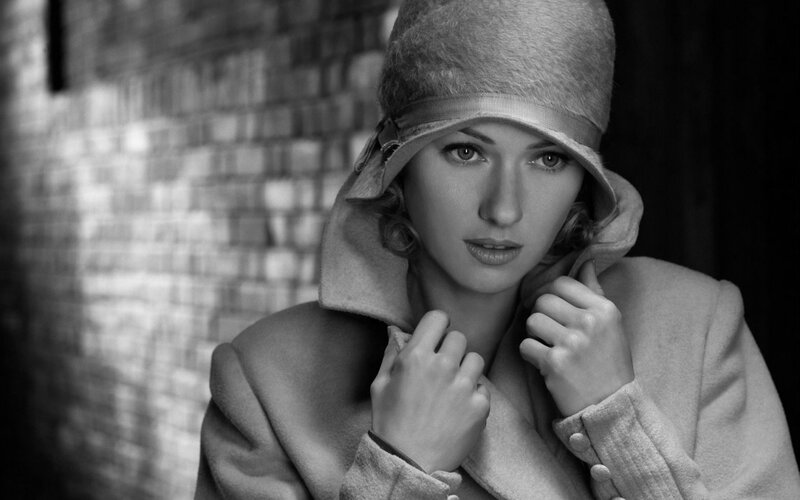 woman in vintage coat and hat