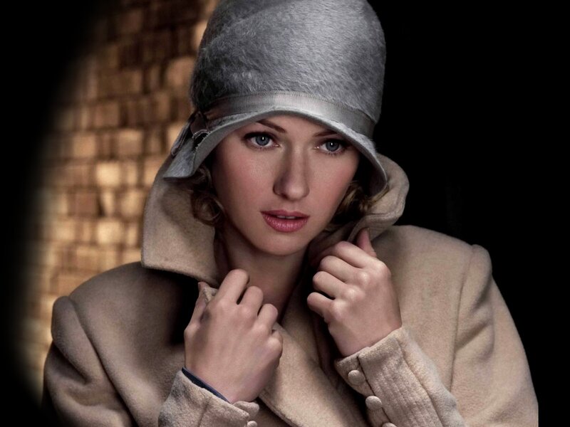 woman in vintage coat and hat