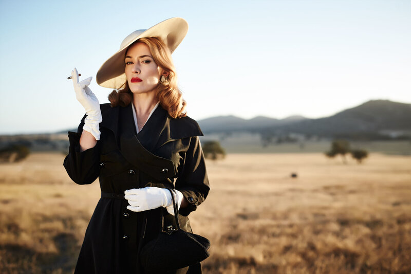 woman in vintage coat and hat