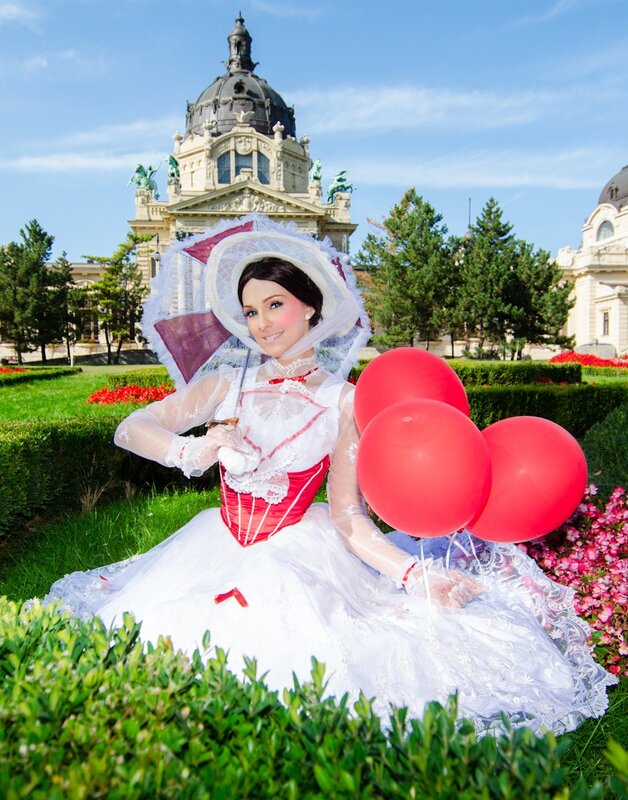 Woman in vintage dress with balloons