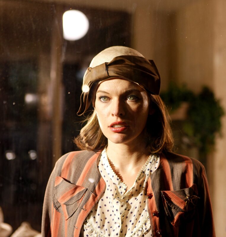 woman in vintage hat and jacket