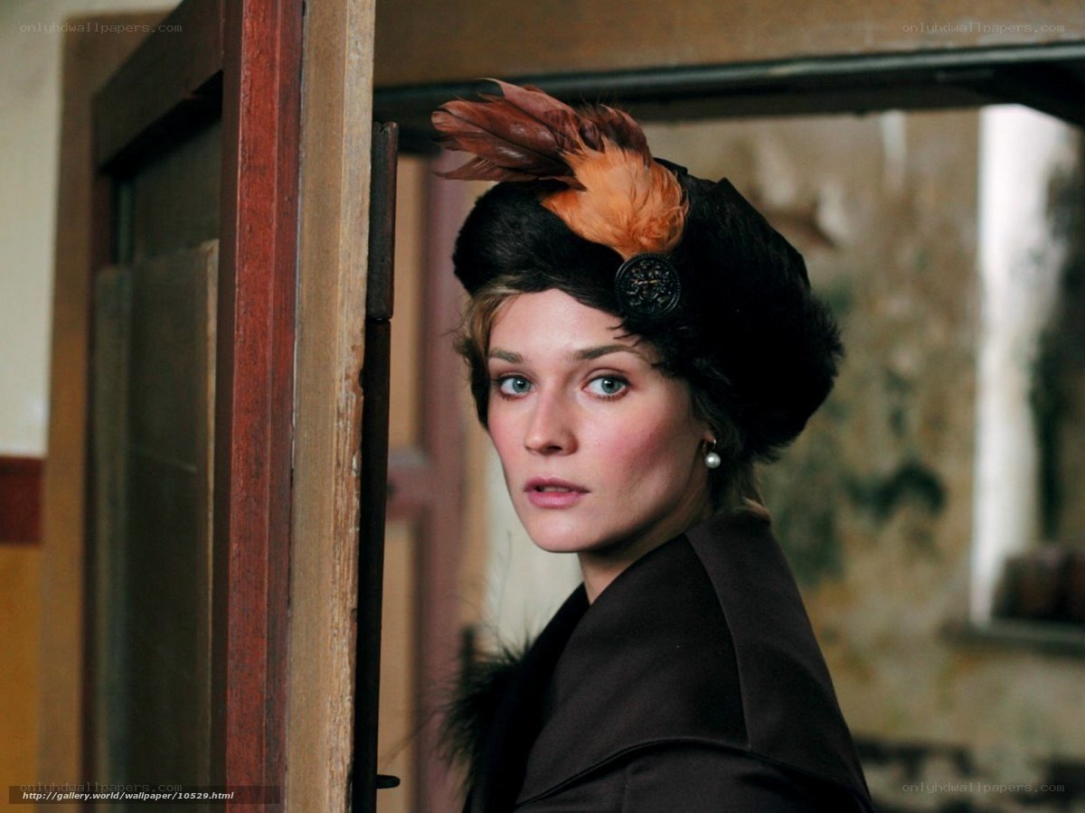 woman in vintage hat looking back