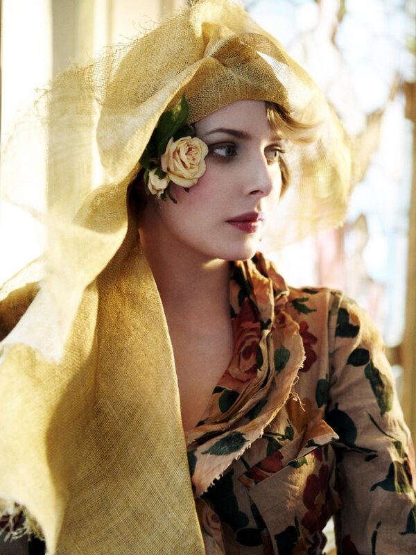 woman in vintage hat with flower