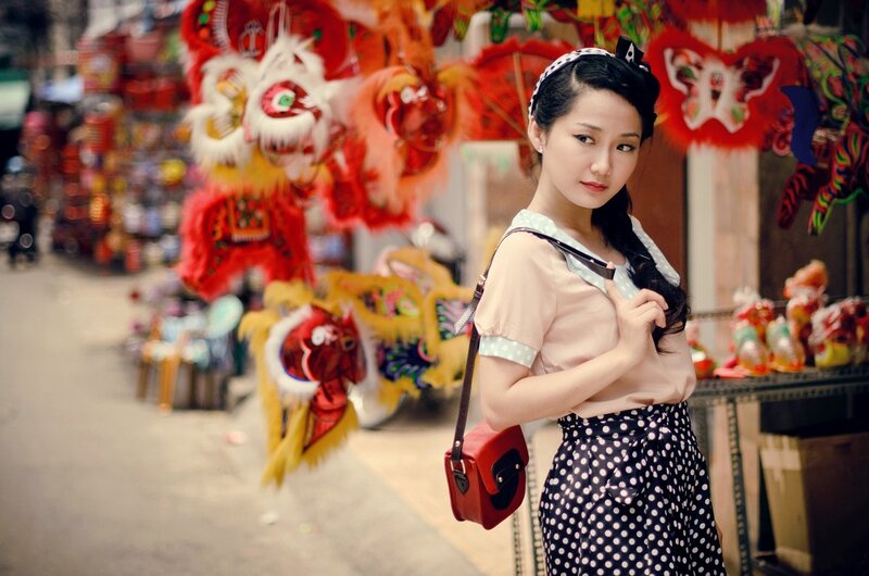 Woman in vintage outfit at market