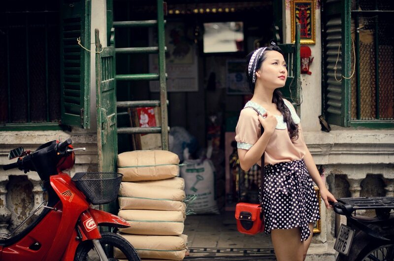 Woman in vintage outfit on street