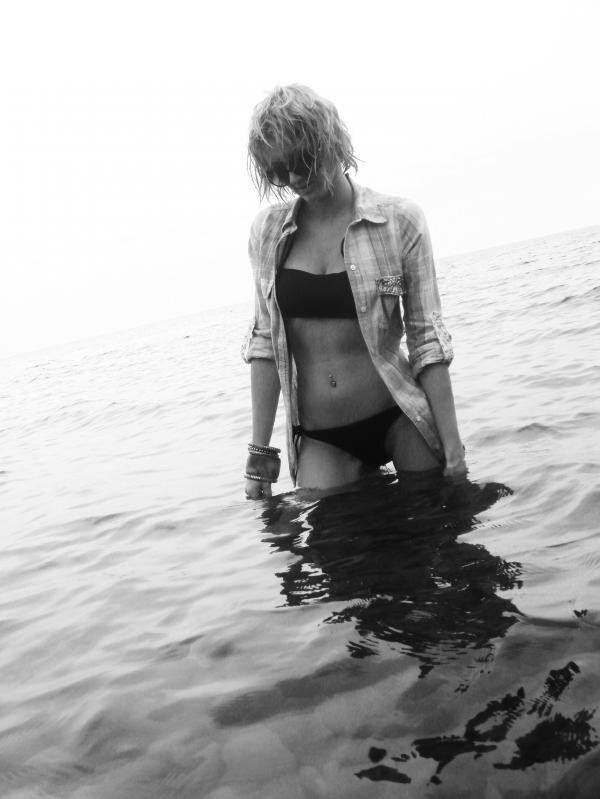woman in water at beach
