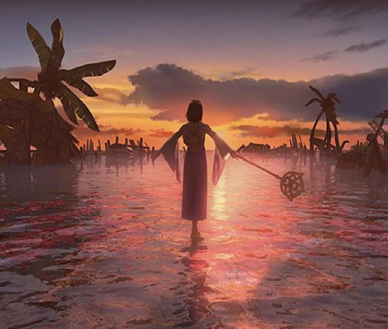 woman in water at sunset