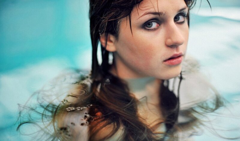 woman in water looking up
