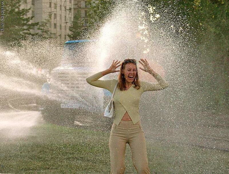 Woman in Water Spray — Green
