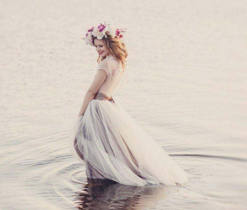 Woman in Water Wearing Crown