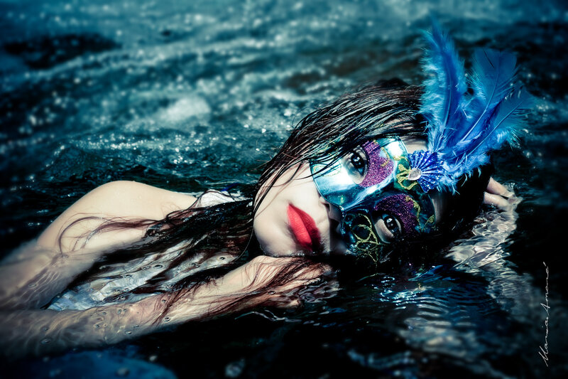 Woman in Water Wearing Mask