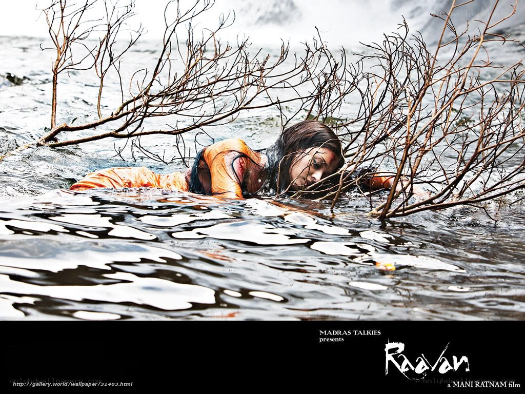 woman in water with branches