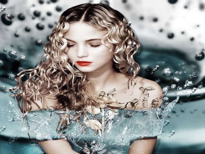 woman in water with curly hair