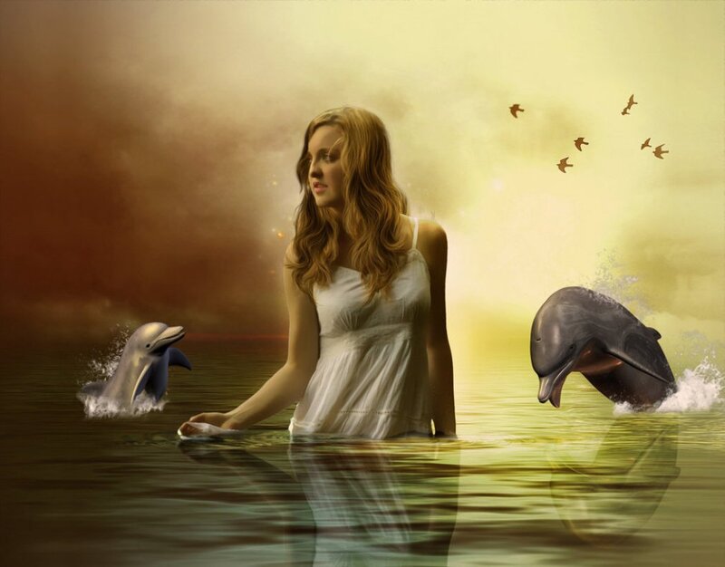 Woman in Water with Dolphins
