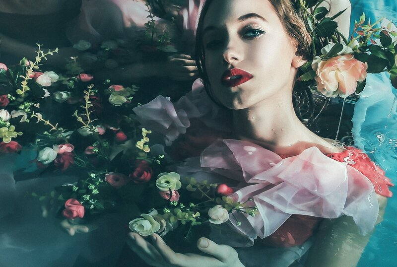 Woman in Water with Flowers — Blue, Dramatic
