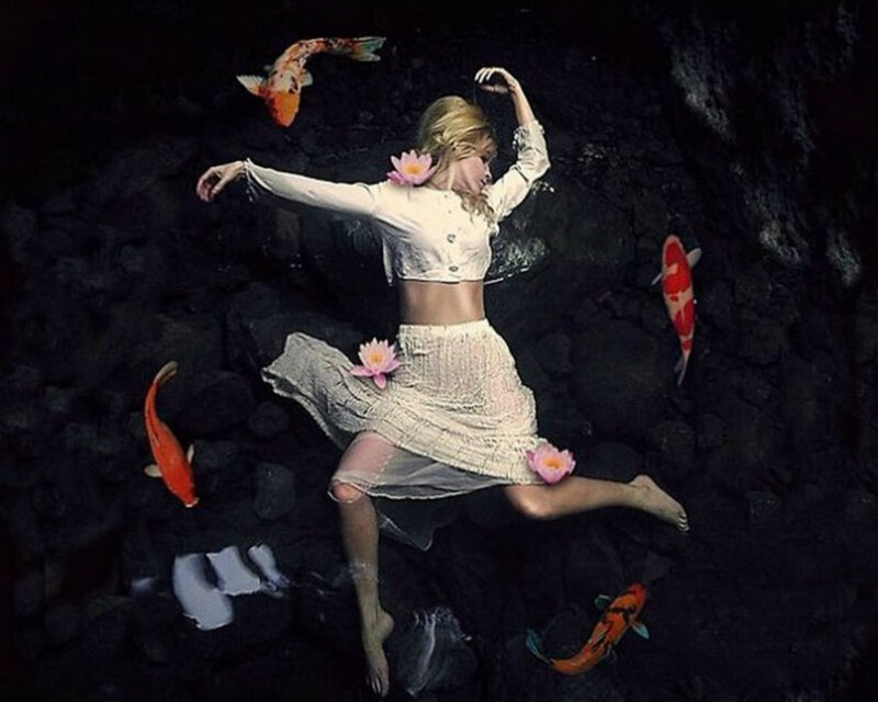 Woman in Water with Koi