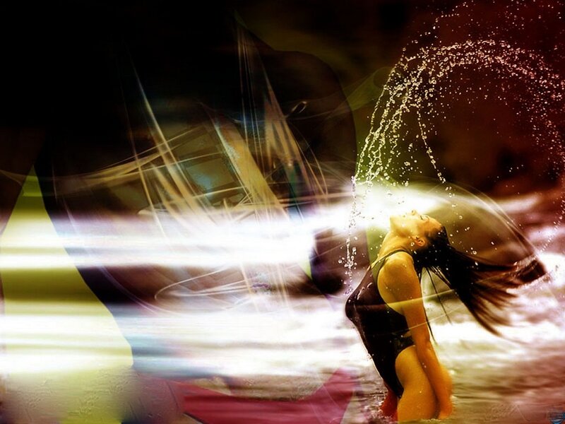 woman in water with light effects