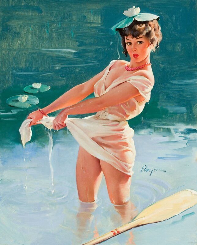 Woman in water with paddle