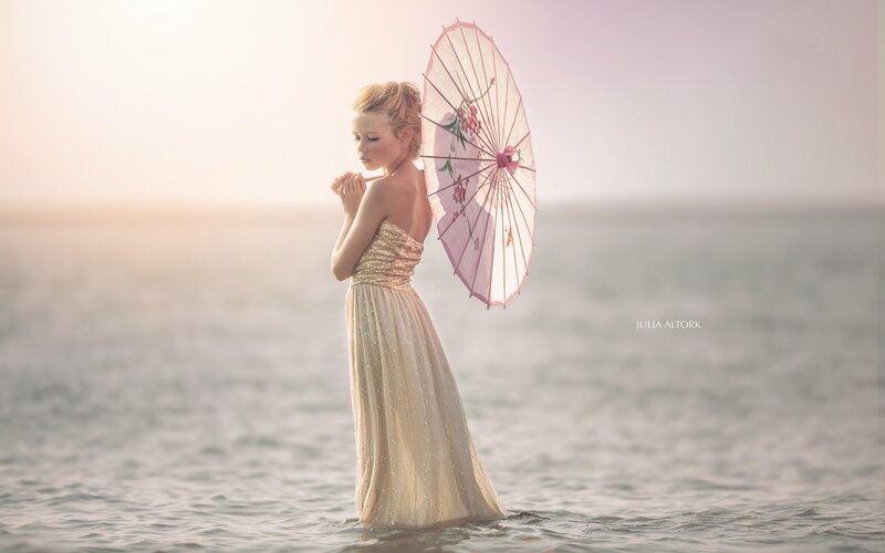 Woman in Water with Parasol
