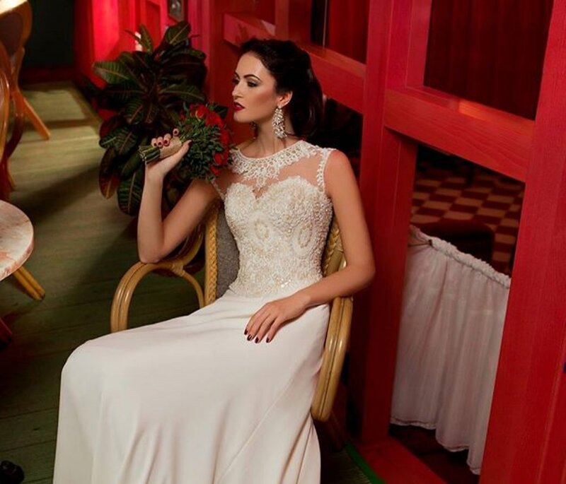 Woman in Wedding Dress — White, Dramatic, Photograph, Bouquet, Chair