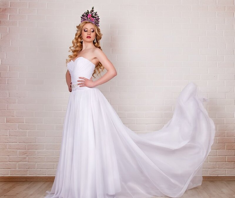 Woman in Wedding Dress — White, Dramatic, Photograph, Flower Crown, Bricks