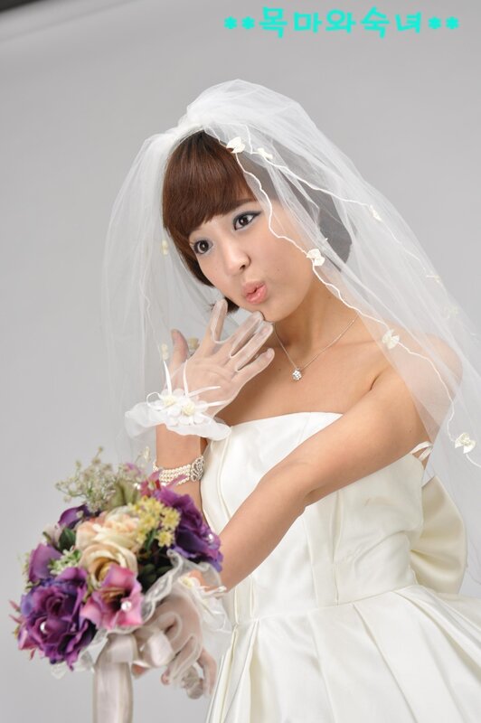 Woman in Wedding Dress — White, Playful, Photograph, Veil, Bouquet, Gloves
