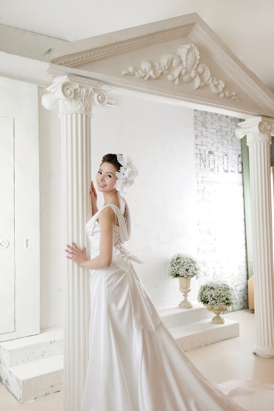 Woman in Wedding Dress — White, Serene, Photograph, Column