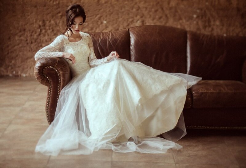 Woman in Wedding Dress — White, Serene, Photograph, Couch, Floor
