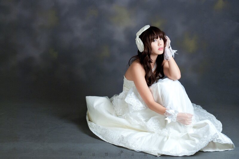 Woman in Wedding Dress — White, Serene, Photograph, Gloves