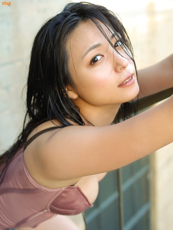 woman in wet top looking up