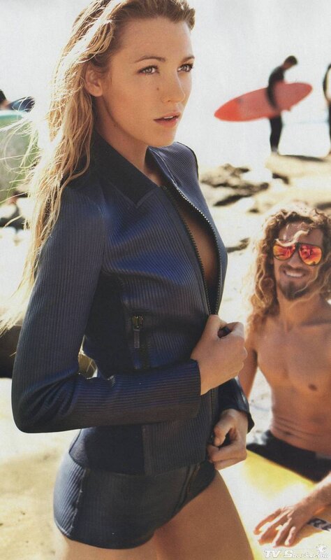 woman in wetsuit at beach