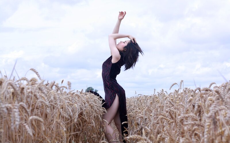 Woman in wheat field