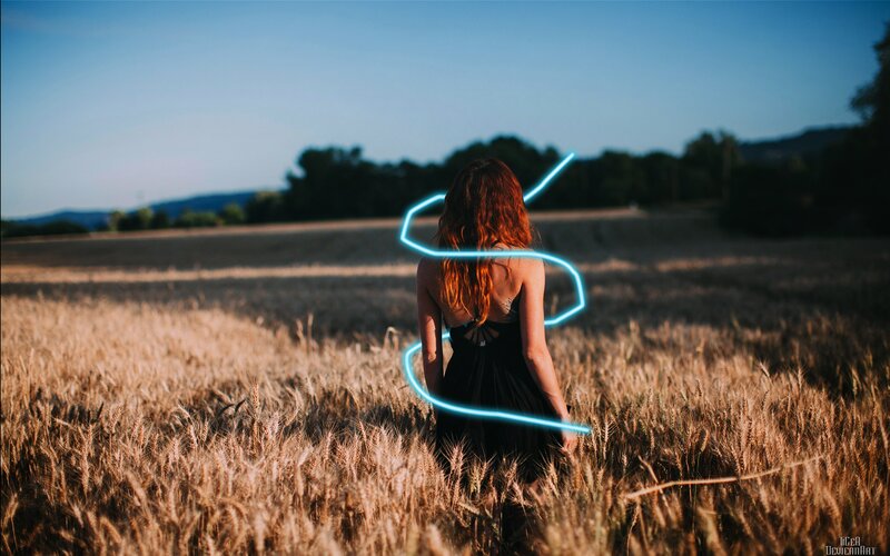 Woman in Wheat Field — Brown, Serene, Sunset