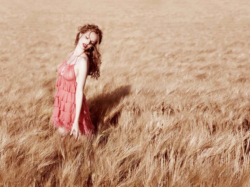 Woman in Wheat Field — Brown, Serene