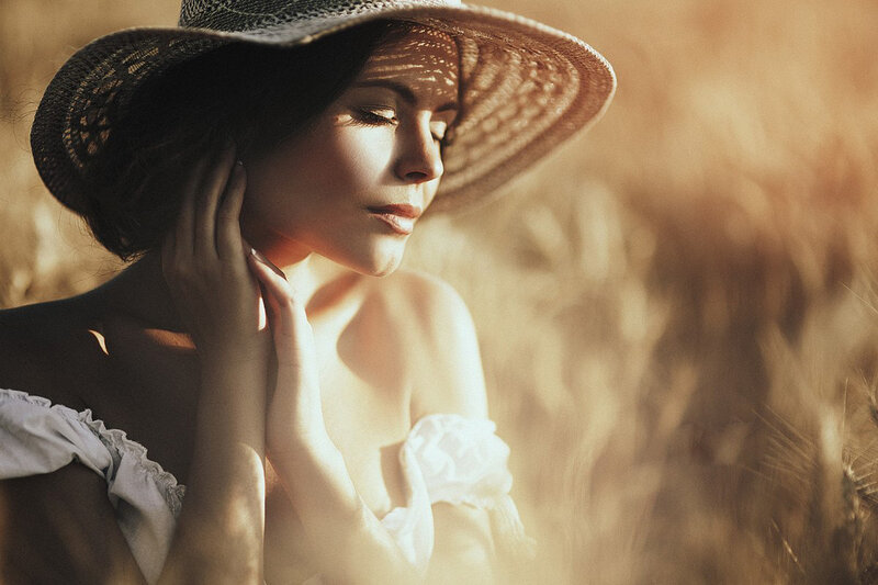 Woman in Wheat Field — Golden, Serene, Sunset, Photograph, Straw Hat