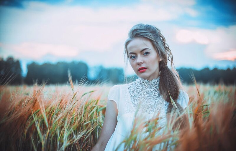 Woman in Wheat Field — White, Serene, Sunset
