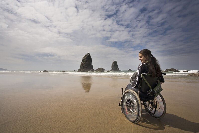 Woman in Wheelchair on Beach