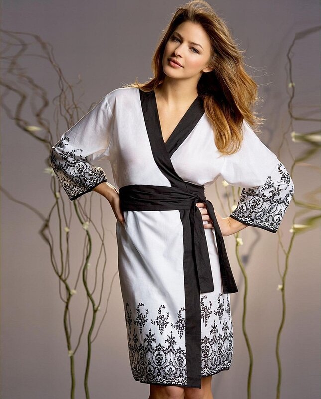 woman in white and black robe