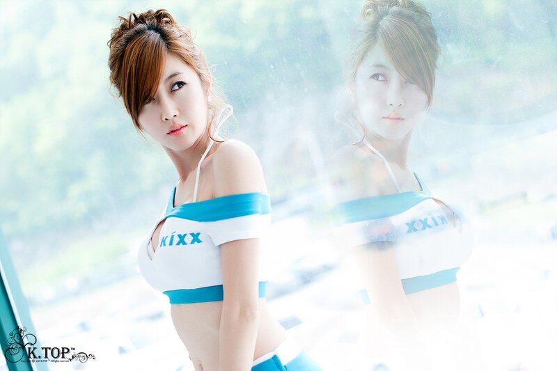 woman in white and blue top