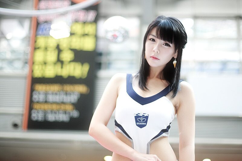 woman in white and blue uniform