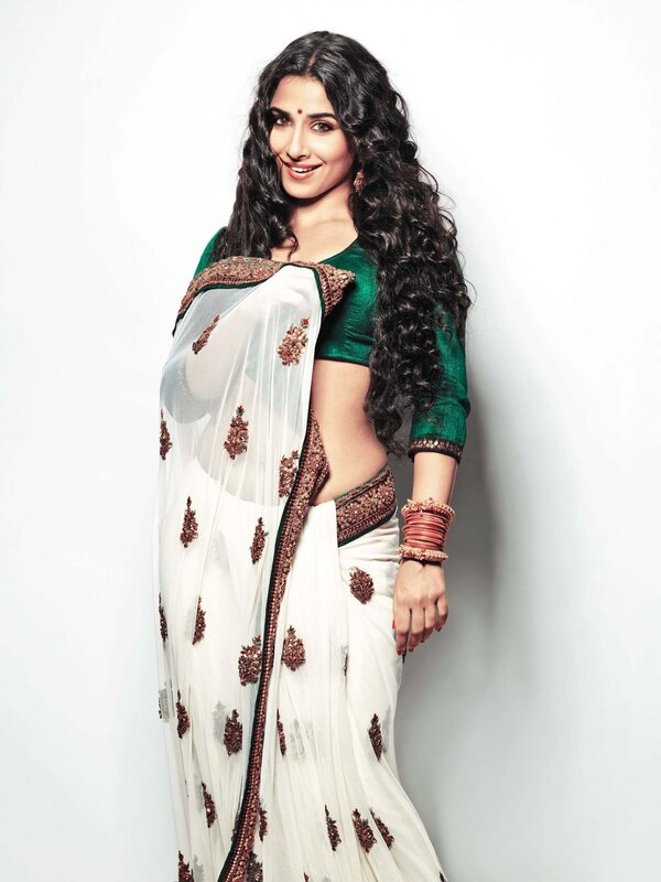 woman in white and green saree