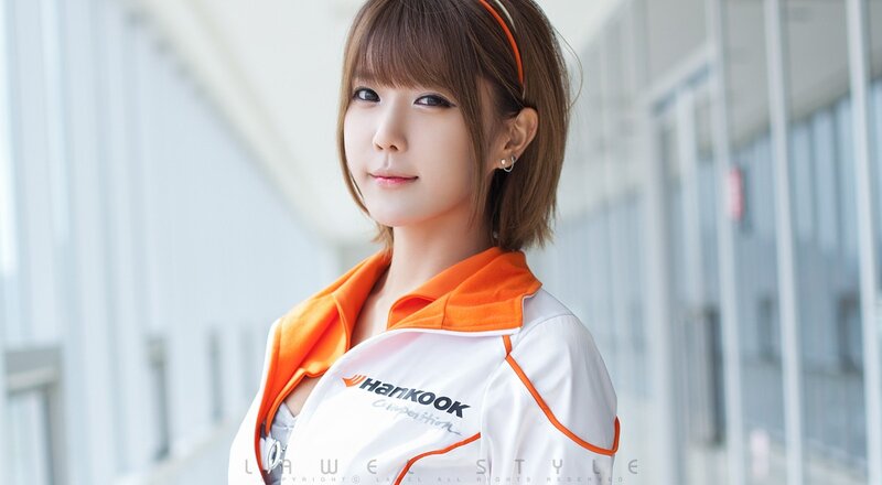 woman in white and orange jacket